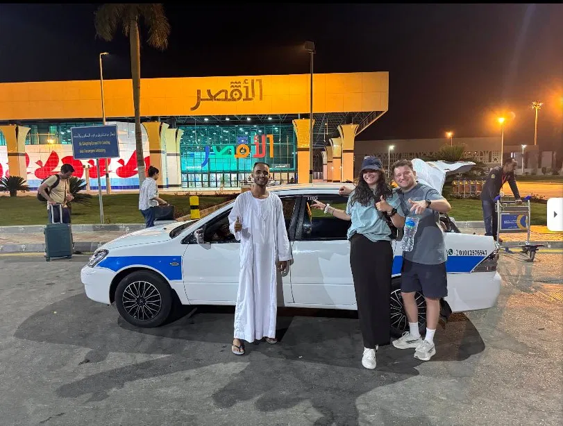 Tito's taxi waiting at Luxor International Airport at night